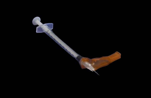 Safety Hypodermic Syringe with Needle Needle-Pro® 1 mL 1/2 Inch 27 Gauge Hinged Safety Needle Regular Wall